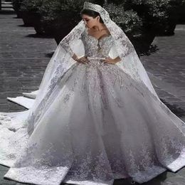 2023 Arabic Charming a line Wedding Dresses Illusion full Lace Appliques designer Crystal Beading satin long Sleeves Chapel Train 263T