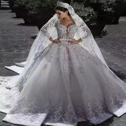 2023 Arabic Charming a line Wedding Dresses Illusion full Lace Appliques designer Crystal Beading satin long Sleeves Chapel Train 287v