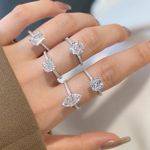 Lüks altın evli tasarımcı yüzüğü Kadın için 925 STERLING Gümüş Elmas Yuvarlak Oval 5A Zirkonia Kadınlar Sevgi Sonsuzluk Sözü Düğün Nişan Yüzükleri Hediye Kutusu Boyutu 5-9