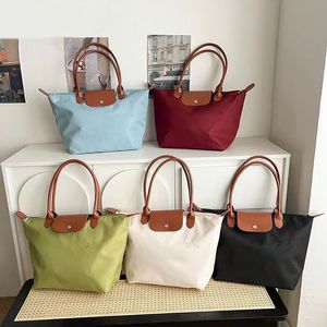 Tote Çanta Tasarımcı Dizüstü Bilgisayar Okulu Tote Beach Seyahat Naylon Tote Çanta Omuz Crossbody Çanta Siyah Çantalar Sıradan Tote Gerçek Deri Tuval Çantası Çok Renk