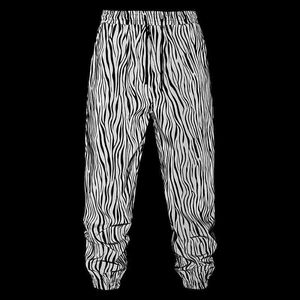 Erkek pantolon hip hop zebra desen yansıtıcı jogger pantolon erkekler floresan dans partisi festival festival rave gece spor pantolon kıyafeti yq240108