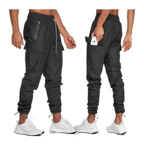 Joggers Sport Pants Mens Pantolon Multipocok Locket Tactical Pantolon Polyester Hızlı Derleme Su Geçirmez Erkekler Trailsuit Sweetyants9219149
