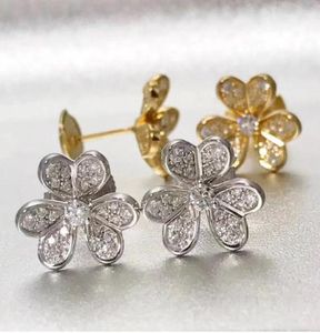 Stud Avrupa lüks moda şanslı parlaklık altın küpeler kadınlar için platin s925 Sterling gümüş tatlı ve hassas ufo kulaklıklar bra4468609