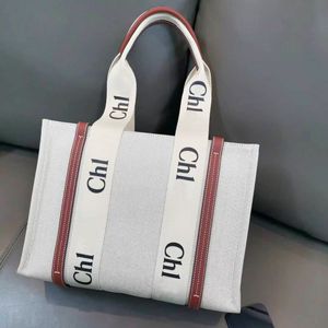 Saco de luxo designer bolsa bolsa woody tote bolsa feminina moda linho praia saco de alta qualidade bolsa de ombro grande capacidade bolsa de compras