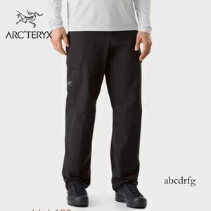 Designer sweatpants Arcterys ARC 'TERYS Archaeopteryx RAMPART PANT Calças de secagem rápida masculinas respiráveis Labirinto / turquesa escuro 32 HBHN 17