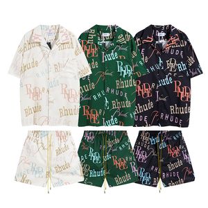 Tasarımcı Erkek Gömlek Set Rhude Shirt ve Kısa Takım Erkekler Kısa Kollu Yüksek Kaliteli Tişört Rhude Tişört Plaj Şortları Deri Şort Yaz Yüzme Moda Giyim