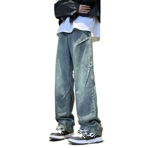 Niş, sevimli ve şık, yıkanmış Amerikan caddesi düz bacak gevşek gündelik pantolon duygusu ile erkek sonbahar tasarımı için kot pantolon