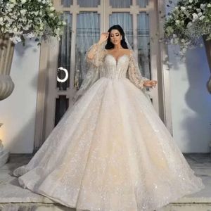 Потрясающие свадебные платья принцессы трапециевидной формы для арабских женщин. Прозрачное платье с длинными рукавами и кружевной аппликацией.