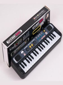 Çok Fonksiyonlu Mini Elektronik Piyano Mikrofonlu Plastik Abs Çocuklar Taşınabilir 37 Anahtar Dijital Müzik Electone Klavye hediyesi5749781