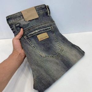 Новые джинсы Мужские дизайнерские джинсы эластичности эластичности джинсы Новый продукт Высококачественный большой коров