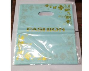 50pcs 2535cm Altın Çiçekler Tasarımı Mavi Plastik Hediye Çantası Giyim Butik Ambalaj Çantaları Tutamaklı Büyük Plastik Alışveriş Çantaları 7956205