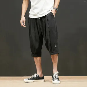 Shorts masculinos esportam calças de treinamento de verão de cor de cor sólida com bolsos de cintura elástica Bande