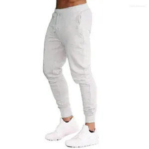 Erkek pantolon uzun spor koşu yan cepleri elastik rahat ve sıcak düz renk ince uyum