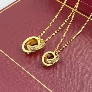 Дизайнер 2024 Choker Женская ожерелье ювелирные изделия из золотого подвесного подвеска двойное кольцо из нержавеющей стали моды моды овальные межблокирующие кольца