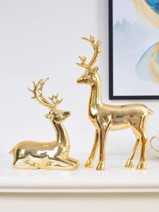 Estatuetas decorativas imitação de ouro Ornamentos de alces de cobre leves Luxury Luxury Wine Decorations Home Nordic Modern Nordic
