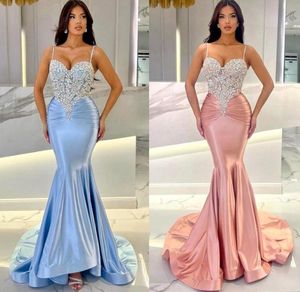 Sexy arabisch blau rosa spaghetti gurte mermaid abendkleider perlenkristalle top ruflen satin long party kleider kleider