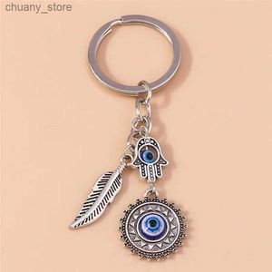 Клайф -шнурки 1pc Bohemian Evil Eye Hamsa Women Hand Hand Caychain Blue Sun Feather Bearing Bag Bag Carew Holder Ring Оптовая y240417