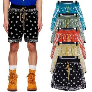 Мужские шорты летняя уличная одежда винтаж кешью полная печать Rhude Shorts Мужские женщины длинные шнурки Blue Green Khaki Rhude Breches с меткой J240325