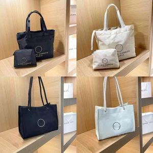 Luxus -Totes für Lady 2pcs/Set Nylon Weibliche Taschen mit Magnetknöpfen und Reißverschlussbeutel mit einer Mini -Geldbörse große Kapazität Schwarz weiße Farbe Open Bag Mode billigere Taschen