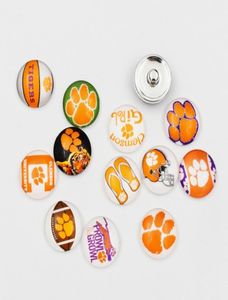 Clemson Tigers Snap Düğmeleri 18mm Yuvarlak Cam Kolej Spor Takımı Snap Charms Kolye Bilezik İçin Yüksek Kaliteli Snap Aksesuarlar E8588956