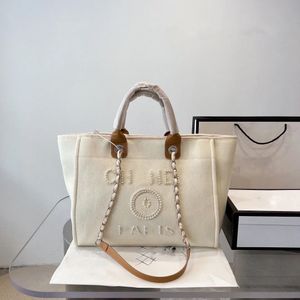 Дизайнерская сумка сумочка летняя пляжная сумка c буква на плечах сумка для флэш -офис. Классическая женская сумка для женского холста высококачественная женская сумка с кнопкой большой способности женская роскошная сумка