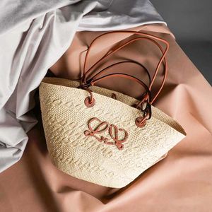 Tasarımcı çanta plaj çantaları lüks çanta saman çanta moda bayan omuz çantası kişilik saman kadın patchwork çiçek tuval aplike moda kılıfları çanta