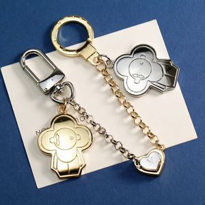 Lüks kalp anahtarlıklar moda kadınlar kordon tasarımcısı manyetik toka zinciri anahtarlık marka mektup anahtar zinciri bag iki bebek