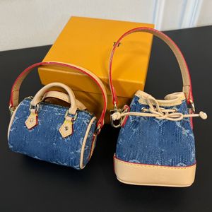 Sacos de desenhista Mulheres Chave Carteiras Marca de Luxo Mini Bucket Bag Bolsa Bolsas Moeda Bolsas Mini Keepall Sacos Chaveiro Carta Homens Sacos Totes Crossbody Pingente Encantos