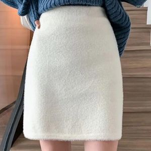 Saias 2024 outono inverno elástico cintura alta veludo de malha mulheres mini saia feminina branco preto curto senhoras bodycon