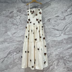 Avrupa moda markası beyaz keten kelebek süslenmiş kayma elbise