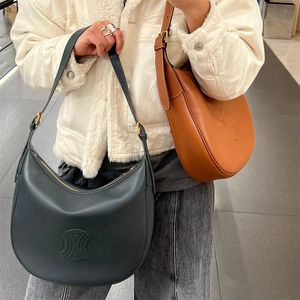 Lüks çanta heloise üçlüsü 10a tasarımcı çantaları kadın gerçek deri altı omuz çantaları erkekler arası vücut debriyaj totes bayan pochette seyahat satchel moda çantası