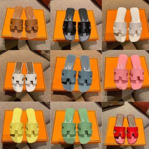 Designer chinelos de couro sandálias de verão para slides femininos outwear lazer férias slides praia chinelos primavera plana sapatos genuínos tamanho EUR 35-42 001