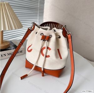 Yeni tasarımcı çanta tuval çanta çantası Avrupa ve Amerika Birleşik Devletleri tarzı kadın çanta elmas çanta çanta inek kova çantası moda tüm kıdemli duyu 21cm