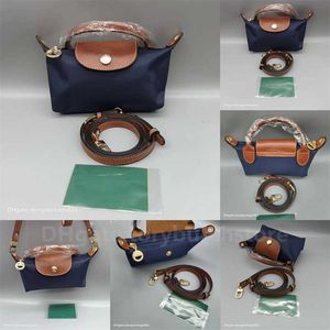 Yüksek kaliteli ucuz mağaza toptan çanta küçük çapraz gövde lüks crossbody mini hamur tatlısı moda mobil naylon cowhide kadın totes çanta tasarımcı çanta