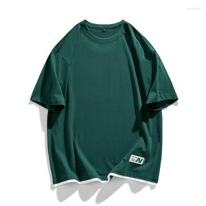 T-shirt da uomo T-shirt con etichetta in tinta unita stile coreano T-shirt oversize Harajuku T-shirt allentata casual Top Collision Design Sense a maniche corte