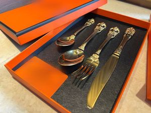 Luxury 4-Piece Stainless Steel Dinnerware Set with Knife, Fork, Spoon, and Dessert Spoon