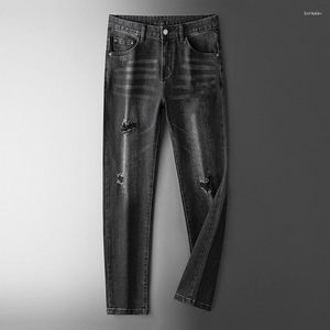 Мужские джинсы 2023 Осень и зимняя черная мужская тенденция световые