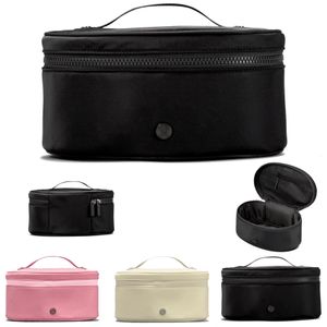 Pembe oval tuvalet üst erişim debriyaj çantaları lüks tasarımcı naylon makyaj kadınlar kare çanta tohumlar seyahat yıkama erkek klasik kozmetik vanity crossbody omuz çantası