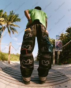 Мужские джинсы Джинсы-карго с несколькими карманами стильные со свободными брюками для мужчин, черные джинсы для парней, широкие джинсы, уличная одежда Розничная/Оптовая торговля 230814