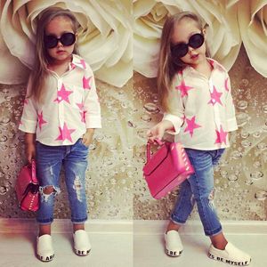 Set di abbigliamento stile di moda per ragazze di chiffon top a maniche lunghe con stelle pantaloni jeans stampati in set autunnali abiti per bambini ST316 230815