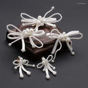 Серьги ожерелья установите украшение волос белая ткань лук жемчужина