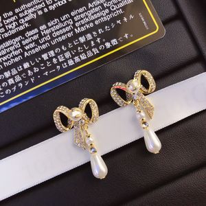 Tasarımcı Aşk Küpe Kadınlar Stud Charm Stamp Pearl Bow Küpeler Lüks Takı Hediye Küpe 18K Altın Kaplama Avrupa Lüks Marka Kelt Prenses Aksesuarları