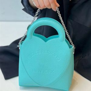 Moda kadın el çantası büyük kaliteli çanta çantalar şeker renkleri zincir crossbody küçük kılıf kabartmalı mektup ile omuz çantalar