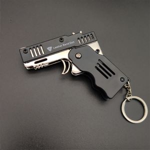 Можно использовать мини -подвесной резиновый пистолет Mini Mini с пластиком с сплавом для ключей для мягких пуль в возрасте от 8 до 55 лет.