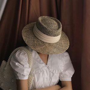 Шляпа шляпы с широкими краями ведро шляпы ручной работы соломенной пляжной шляпы для женщин летняя шляпа Панама мода мода вогнутая защита от солнца.