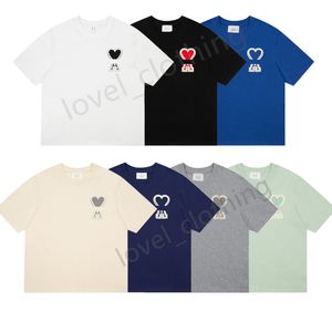 Мужские женские футболки Дизайнер с коротким рукавом Летняя мода бренд досуг свободный прилив Высококачественный хлопок с сердечным принтом Роскошные топы Размер одежды S-XL