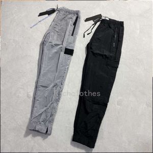 Calças masculinas de alta qualidade pedra algodão nylon designer estilo senhoras o mesmo casal moda personalidade 99048 cor sólida 2023