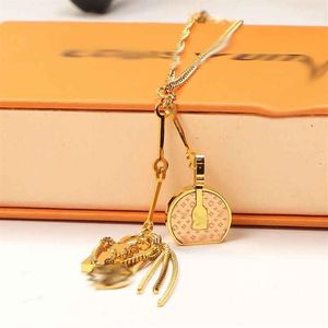 Manufacturers whole European and American fashion simple accessories lock round cake bag pendant stainless steel couple neckla244Y