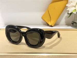Uppblåsta cateye-solglasögon i nylon modell 40100 acetatbåge enkel och avantgardistisk stil high-end utomhus UV400 skyddsglasögon