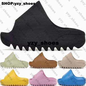 Ayakkabı Terlik Sandal Yzys Slaytlar Boyut 5 11 Kadın Erkek Tasarımcı Ayakkabı Us 5 US5 US5 Azure Kemik Bayanlar 9329 Sliders Onyx Atletik Siyah Slide Sarı Pembe Beyaz